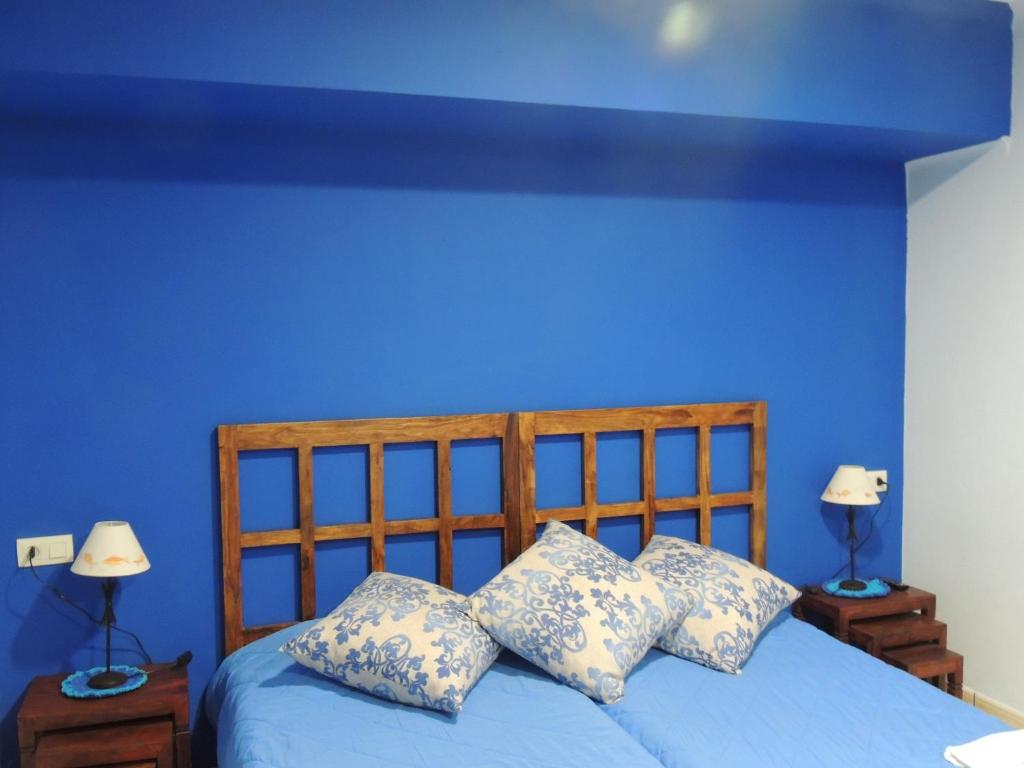 Postel nebo postele na pokoji v ubytování Hostal Can Massot
