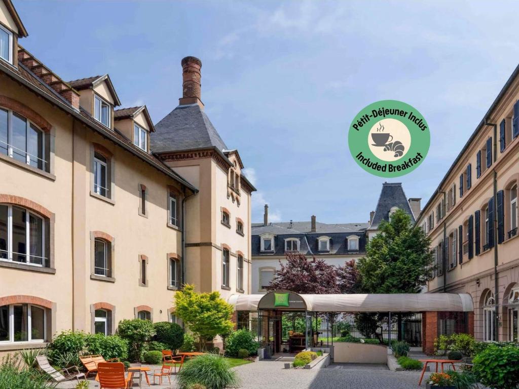 a building with a sign in front of it at Ibis Styles Colmar Centre in Colmar