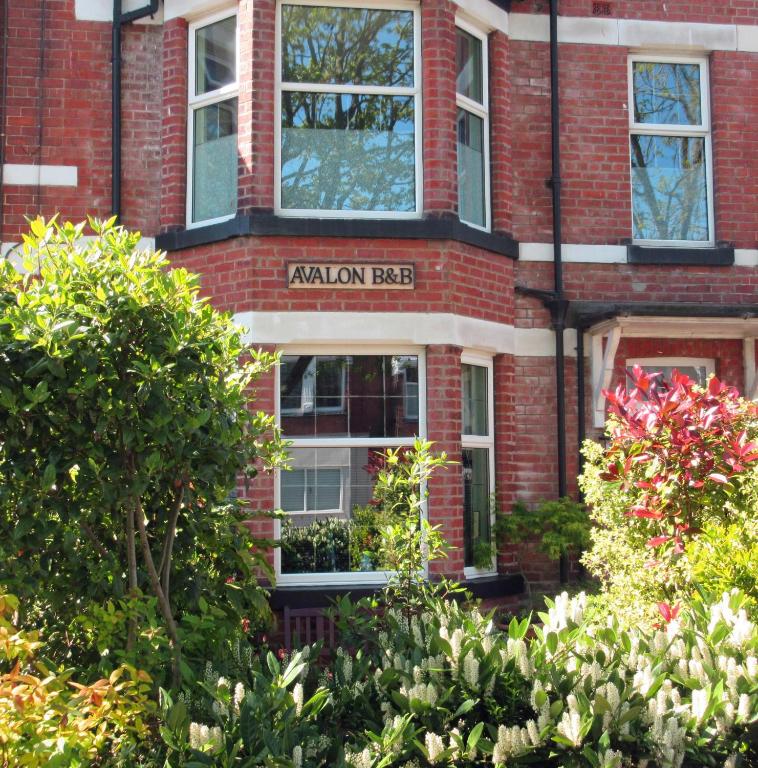 a red brick building with a sign that reads akron breed at Avalon B&B Scarborough in Scarborough