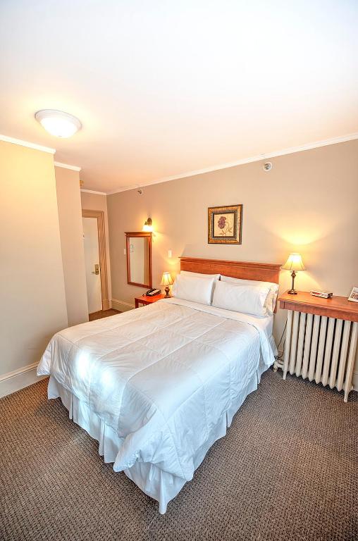 Letto o letti in una camera di The Sonata Inn