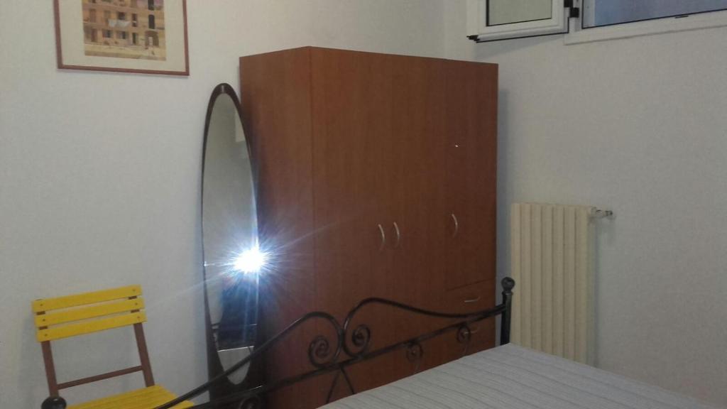 Łóżko lub łóżka w pokoju w obiekcie Villa Graziella