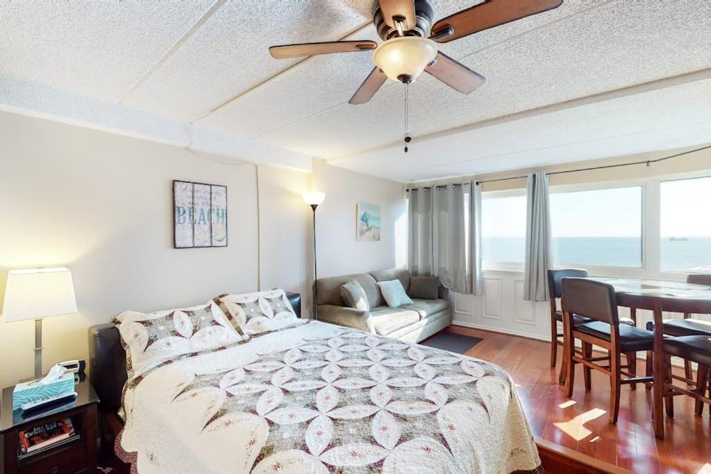 a bedroom with a bed and a ceiling fan at Atlantis 502 in Ocean City