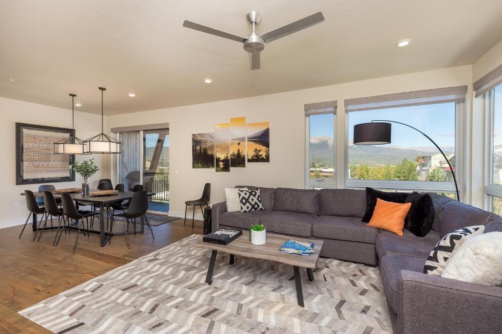 a living room with a couch and a table at Sail Lofts #301 in Dillon