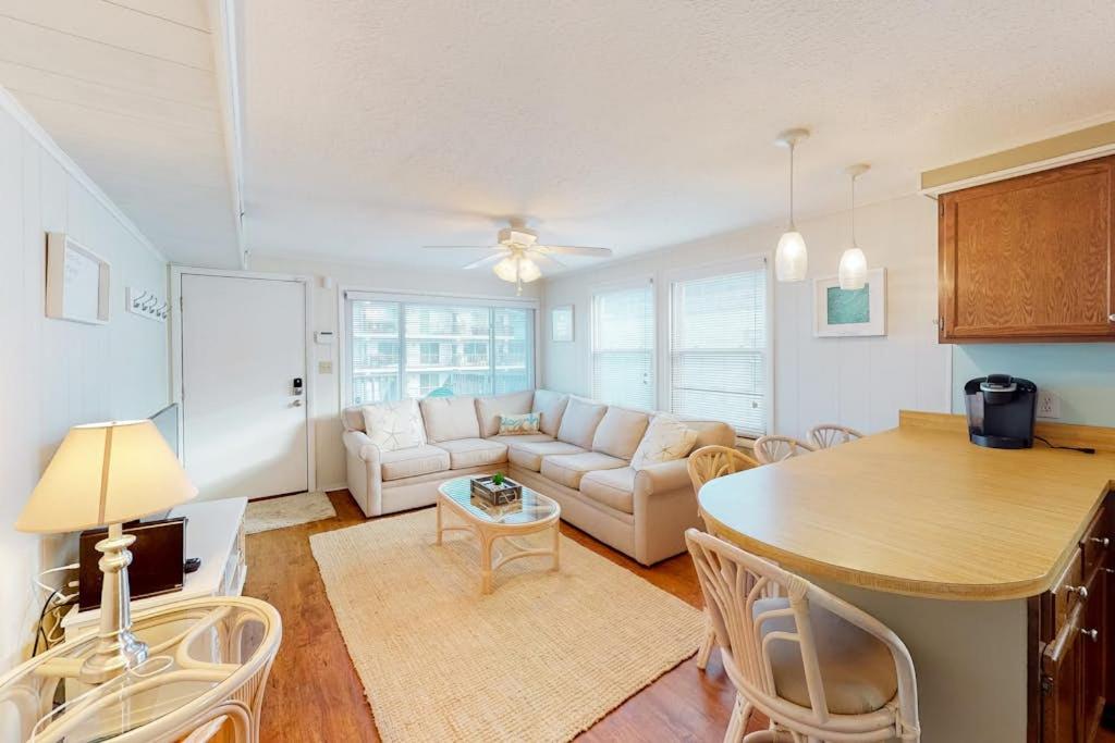 a living room with a couch and a table at North Point Condo 301 in Ocean City
