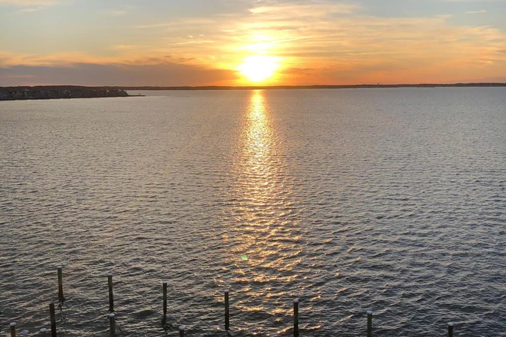 a sunset over a large body of water at Thunder Island 28A in Ocean City