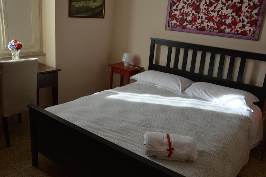 Postel nebo postele na pokoji v ubytování B&B Cumpari Turiddu