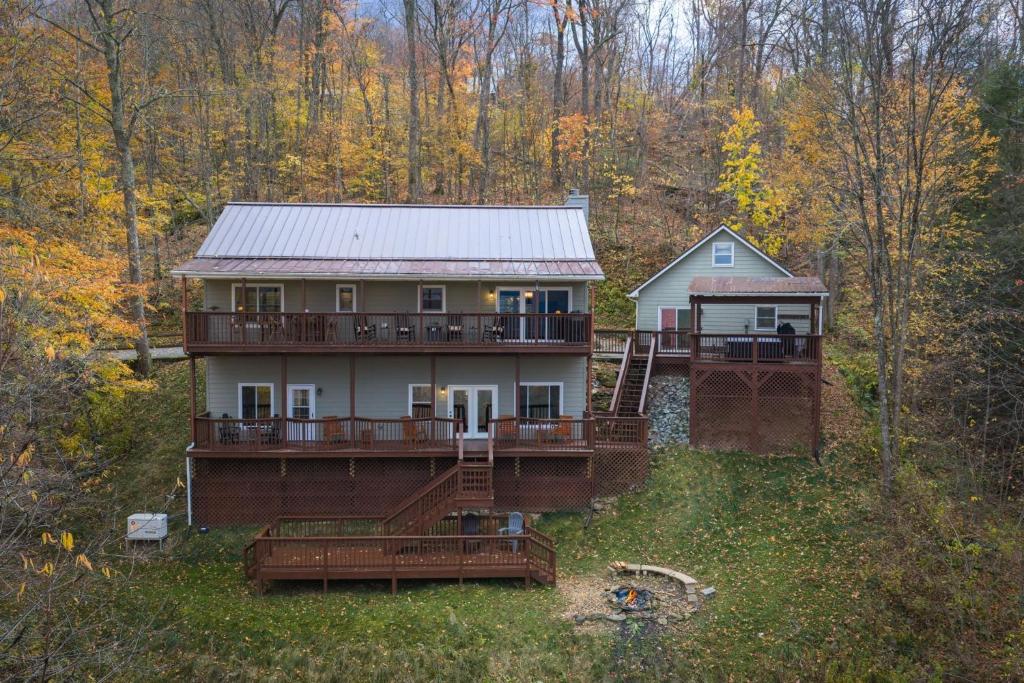 an aerial view of a house in the woods at Meadow View in Banner Elk