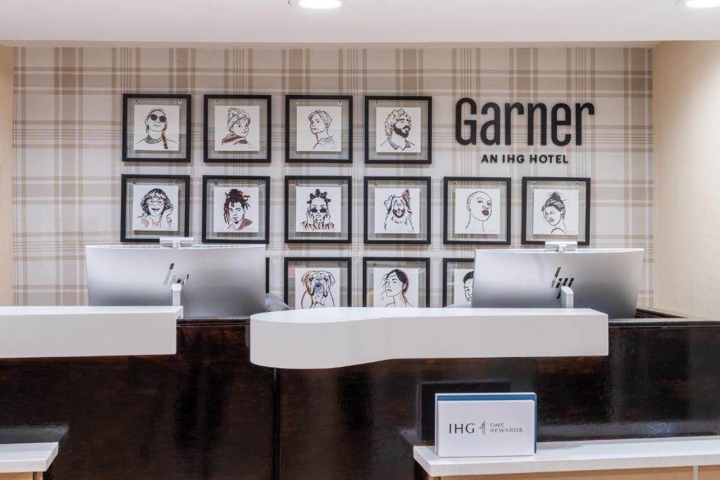 a store with framed pictures on the wall at Garner Hotel Wadsworth by IHG in Wadsworth