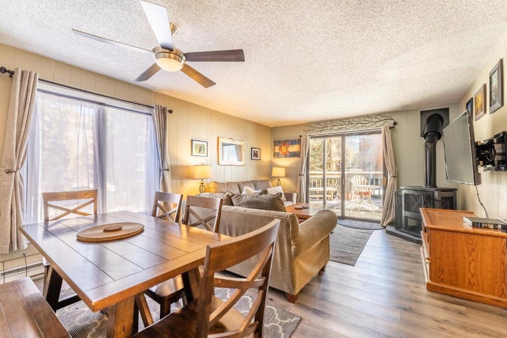 a living room with a table and a couch at Key Condo #2929 in Keystone