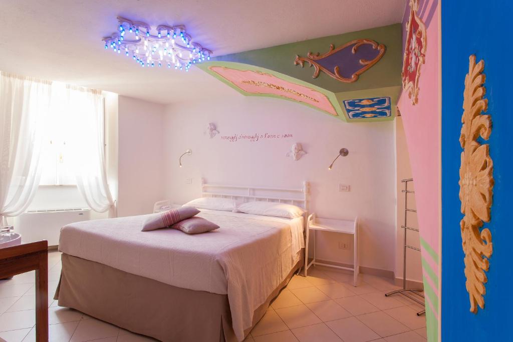 Postel nebo postele na pokoji v ubytování Casa Diva