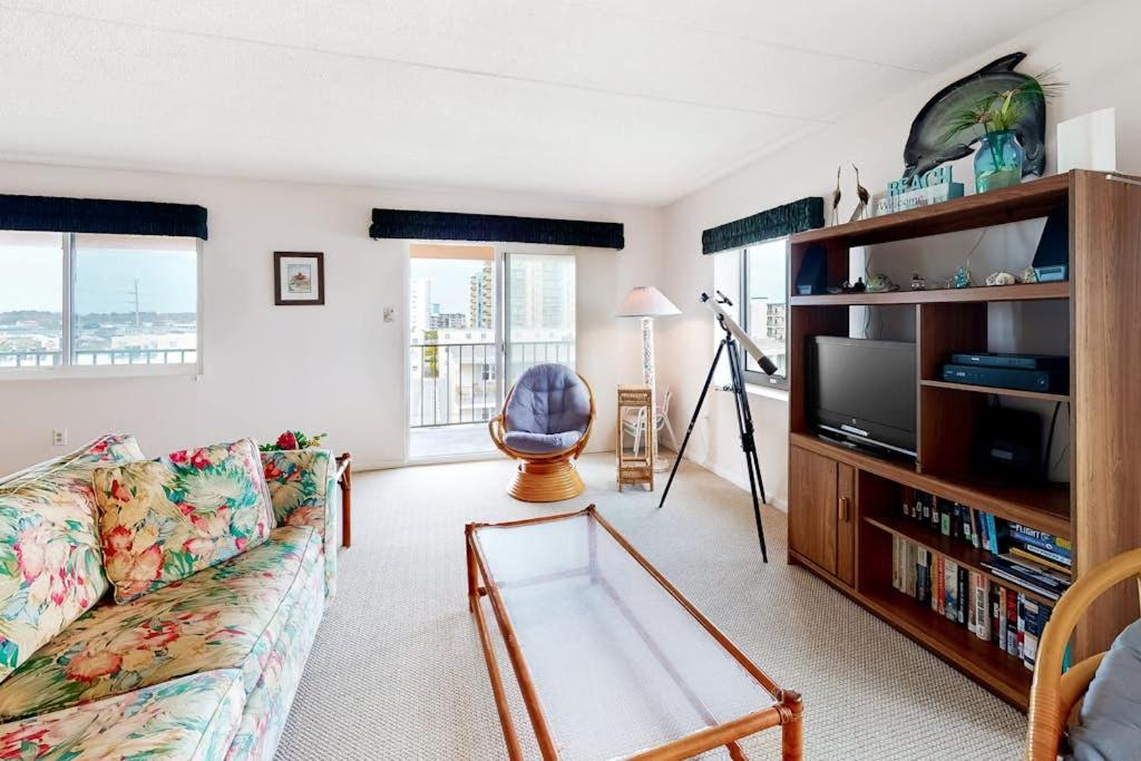 a living room with a couch and a tv at Sunny Sands 401 in Ocean City