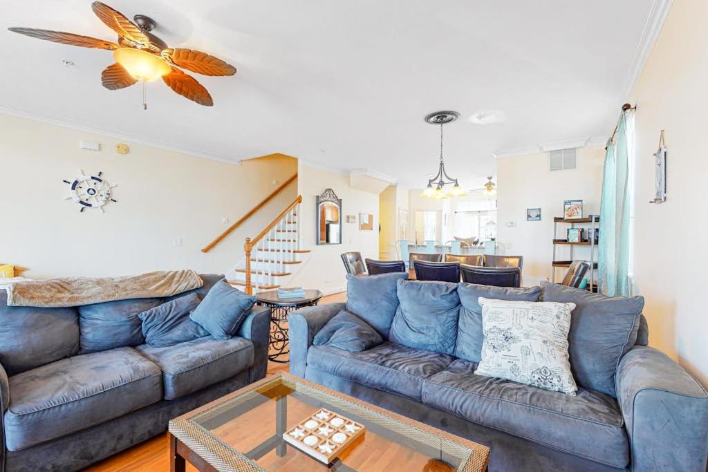 a living room with a couch and a table at Saint Louis Ave, Unit D in Ocean City