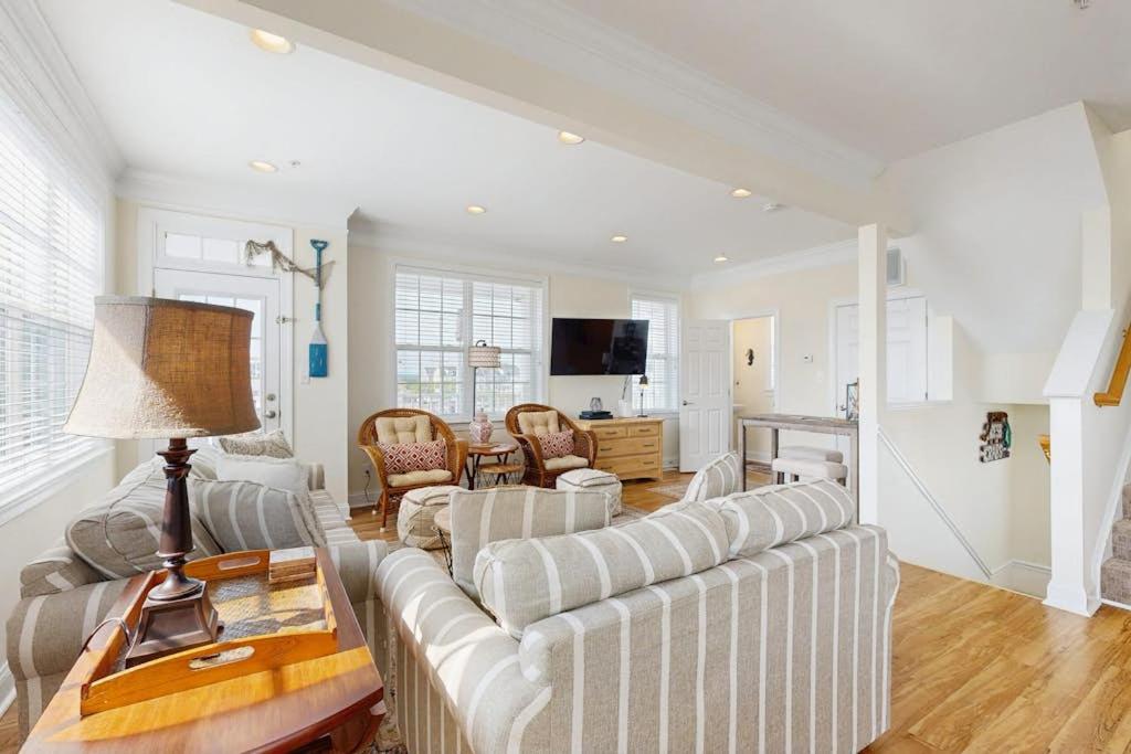a living room with a couch and a table at 16 The Palms in Ocean City