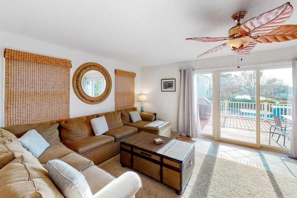 a living room with a couch and a ceiling fan at 604 Seaweed Lane #1 in Ocean City