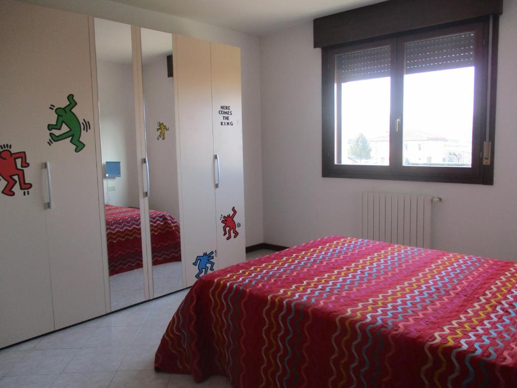 Postel nebo postele na pokoji v ubytování Il Grande Fiume
