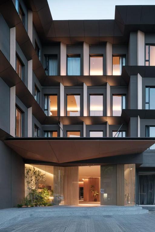 an external view of a building with a facade at The Yard Boutique Hotel Shanghai 一隅酒店上海虹桥漕河泾店 in Shanghai