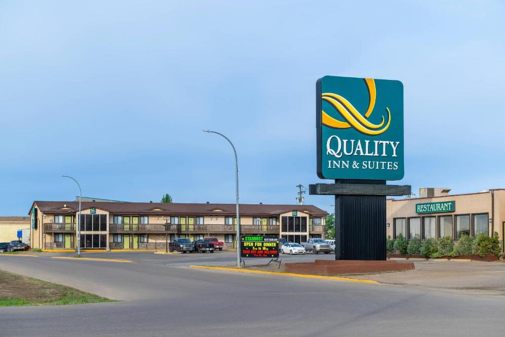 a walmart sign in front of a building at Quality Inn & Suites High Level in High Level