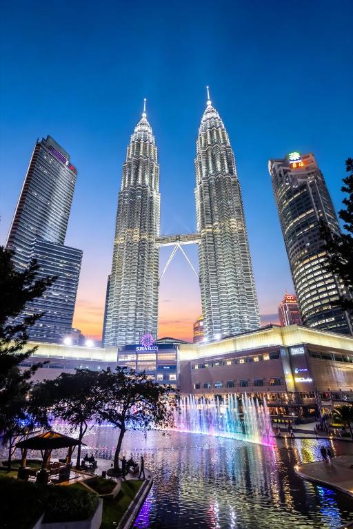 a view of the petronas towers at night at Veone Hotel Kuala Lumpur in Kuala Lumpur