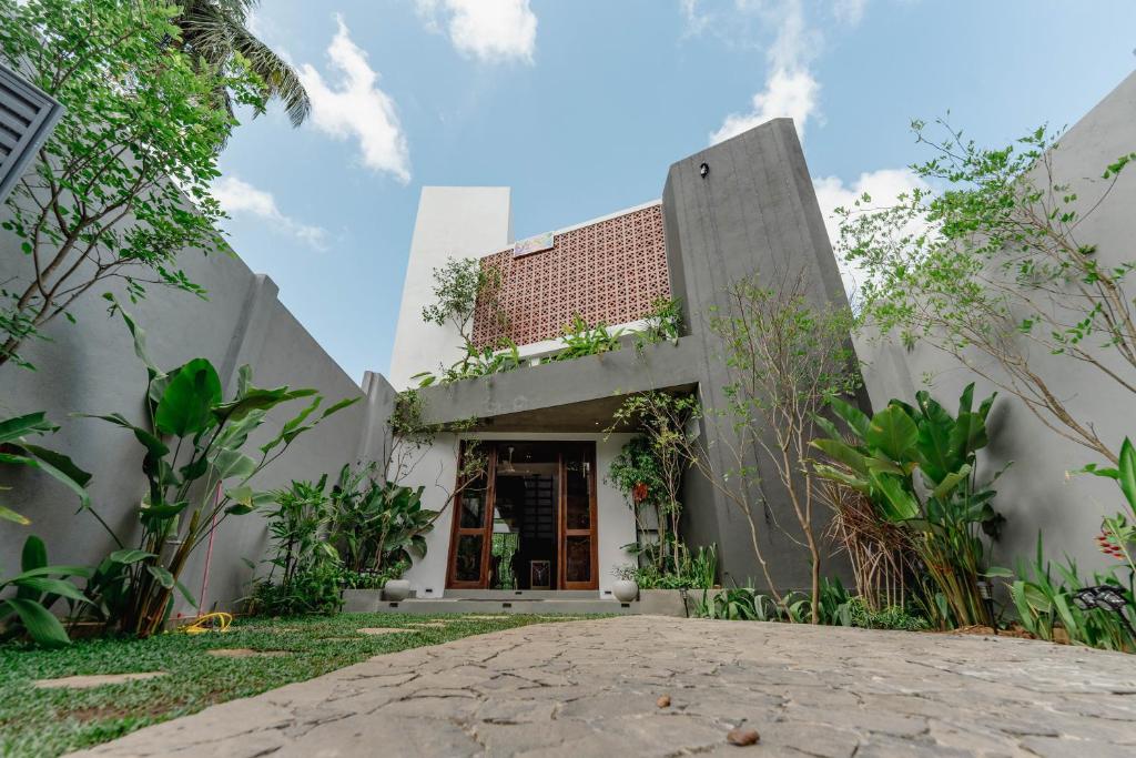 an external view of a house at The Embrace Luxury Villa - Hiriketiya in Dickwella