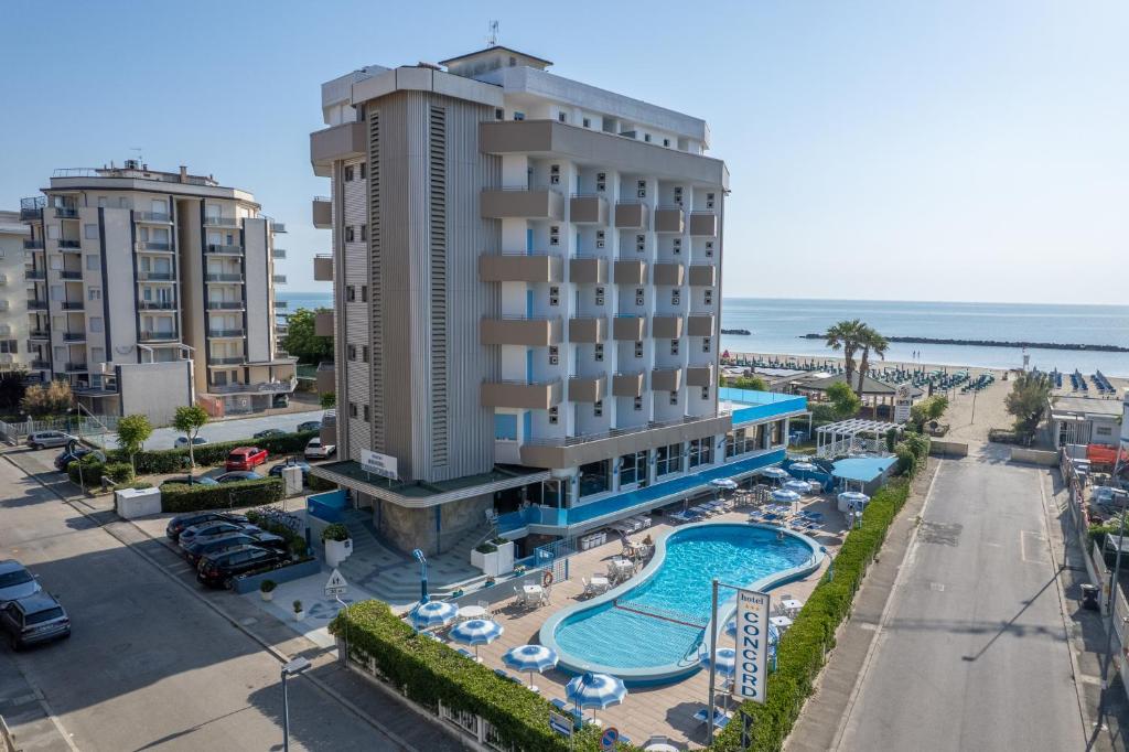 an aerial view of a hotel and the beach at Hotel Concord in Lido di Savio