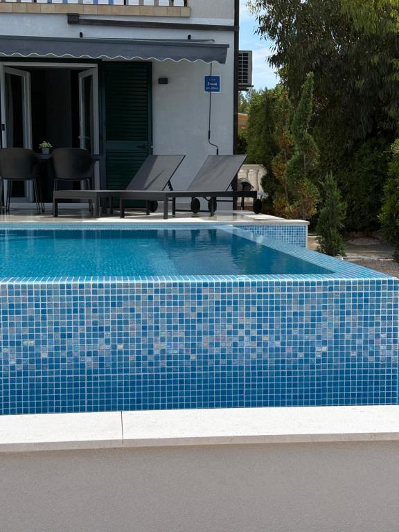 Apartment Lydia with private pool on the beach