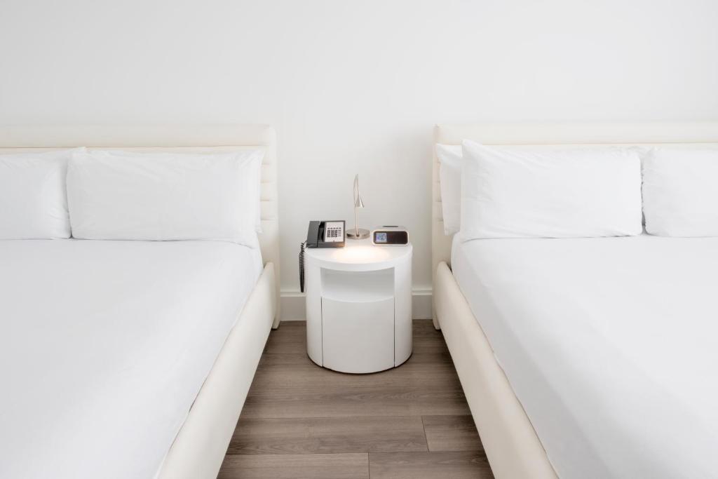 Postel nebo postele na pokoji v ubytování President Hotel