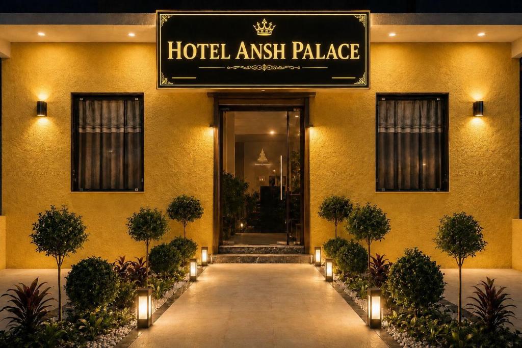 a hotel entrance with a sign that reads hotel embassy palace at Hotel Ansh Palace - Village Near Taj Mahal Agra in Tājganj