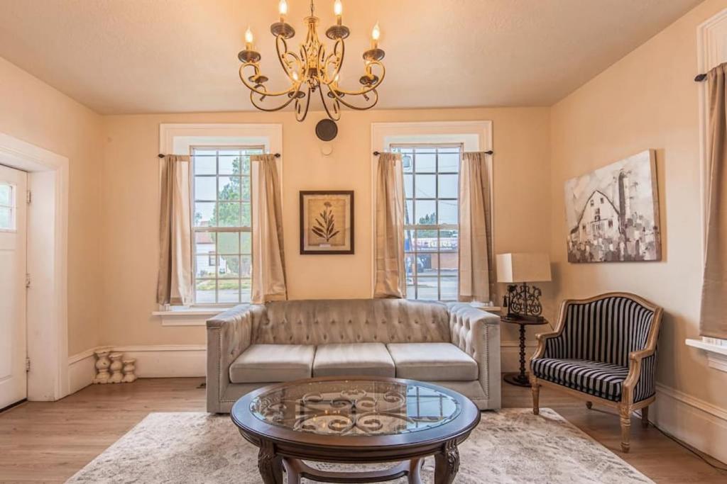 a living room with a couch and a table at 406 Canyon Rd #1 in Ogden