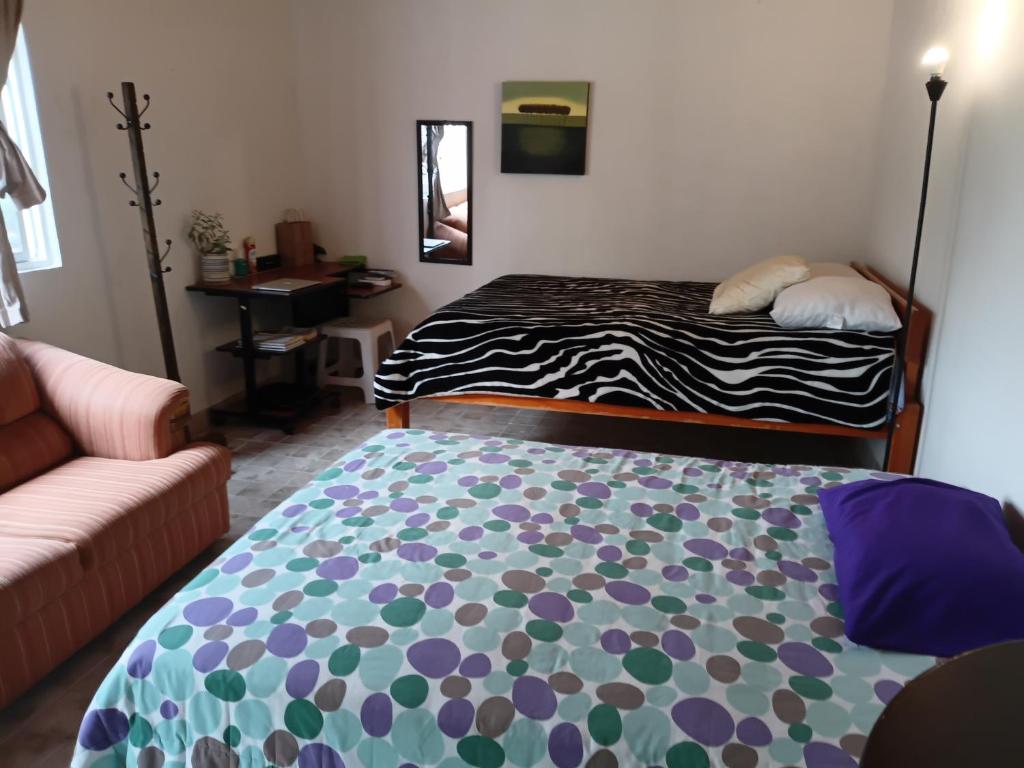 เตียงในห้องที่ Depa Tequis