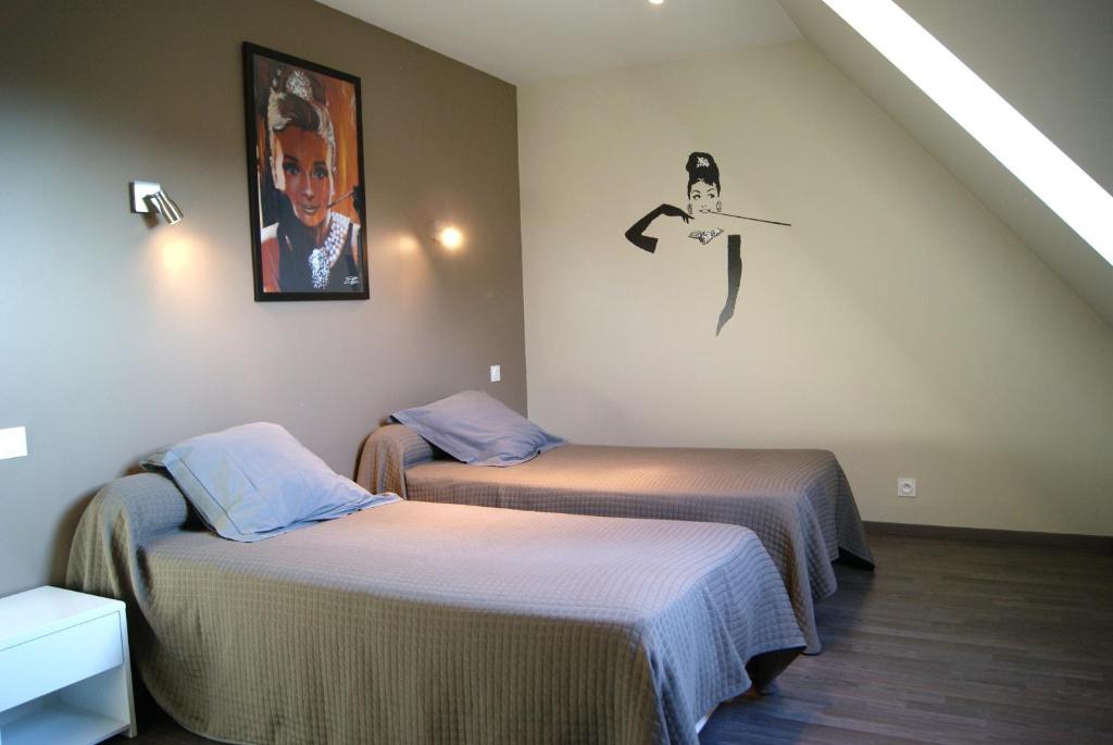 Postel nebo postele na pokoji v ubytování Residence Kersaliou