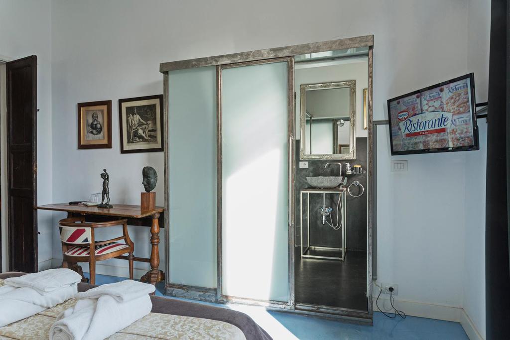 Kuchyň nebo kuchyňský kout v ubytování Loft Garibaldi