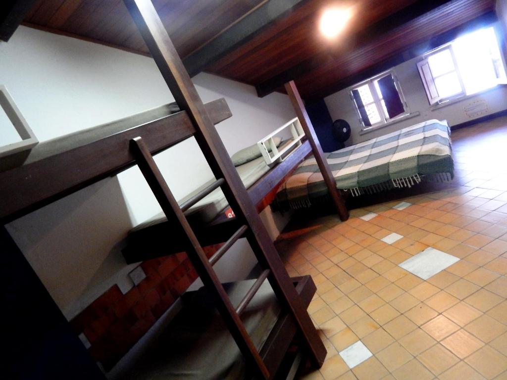 Postel nebo postele na pokoji v ubytování Laranjeiras Hostel