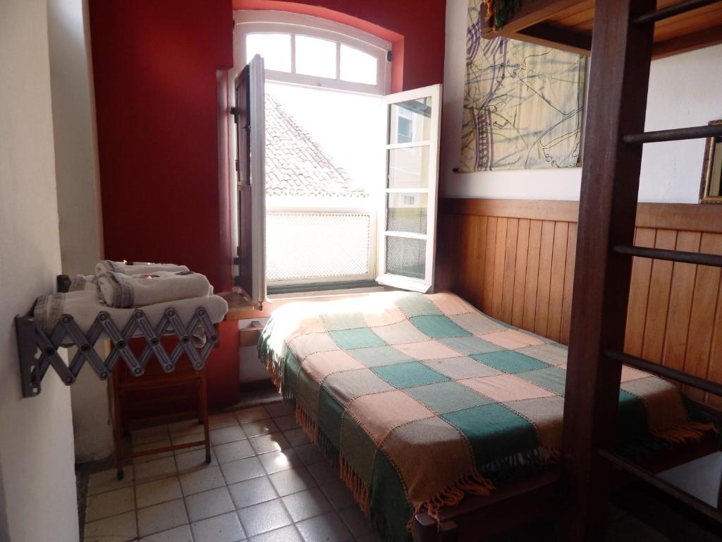 Postel nebo postele na pokoji v ubytování Laranjeiras Hostel