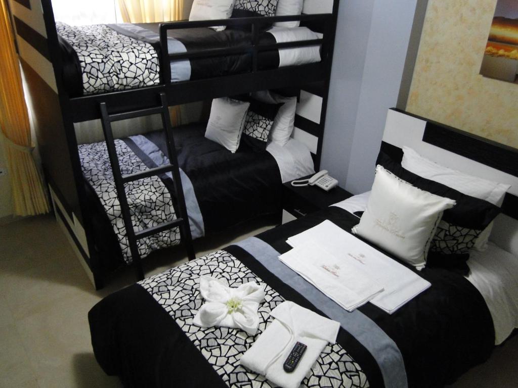 Postel nebo postele na pokoji v ubytování Hotel Tababela Land