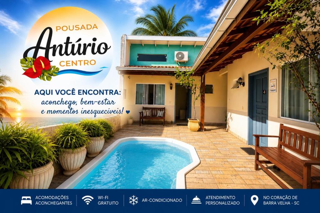 a villa with a swimming pool in front of a house at Pousada Anturio Centro in Barra Velha