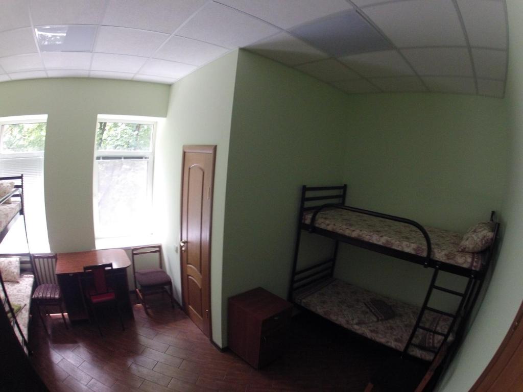 Postel nebo postele na pokoji v ubytování Bike Hostel Dnepr