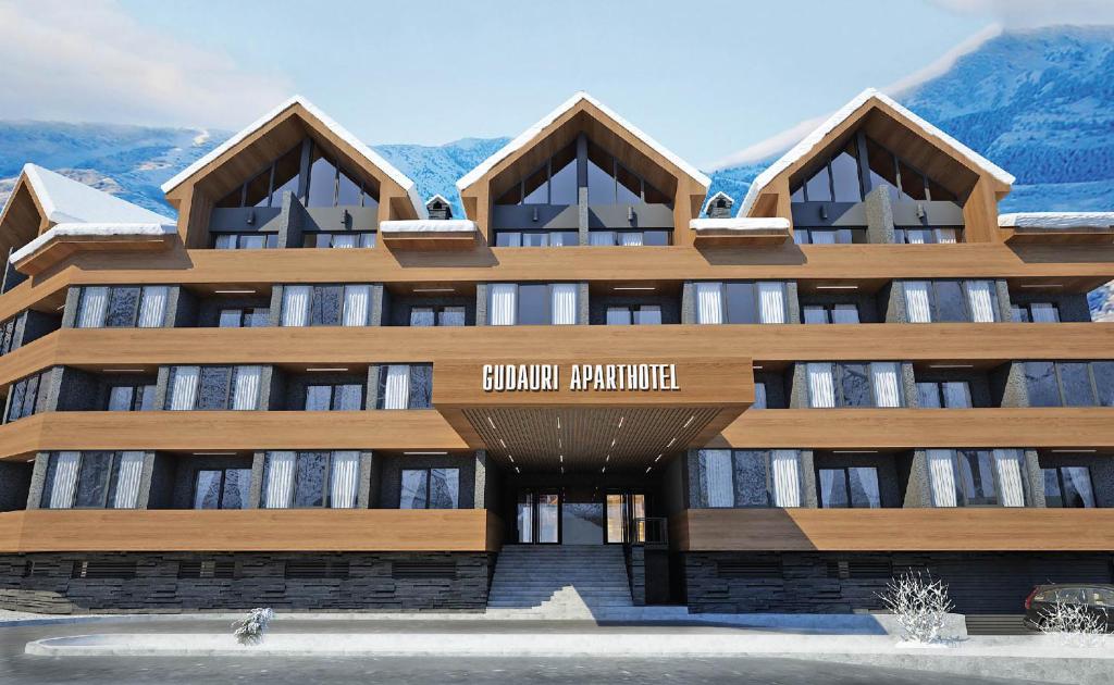 a building with a sign that reads golden parachute at Apartment New Gudauri IV in Gudauri