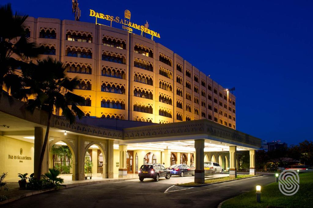 
a large building with a clock on the front of it at Dar es Salaam Serena Hotel in Dar es Salaam
