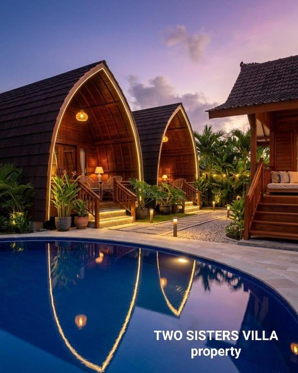 two sisters villa property with a swimming pool at Two Sisters Villa with Pool - Sire in Tanjung