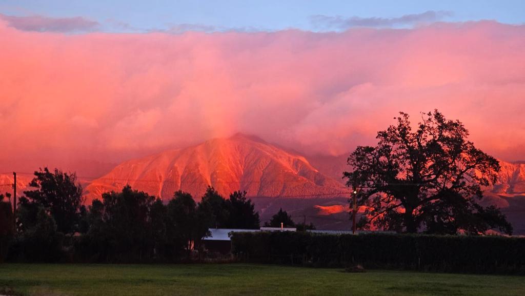 a view of a mountain with a rainbow at Bahara Accommodation in Springfield