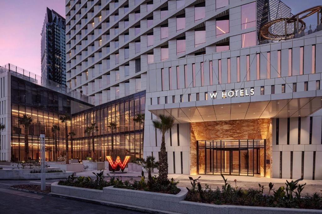a building with a sign on the side of it at W Riyadh - KAFD in Riyadh