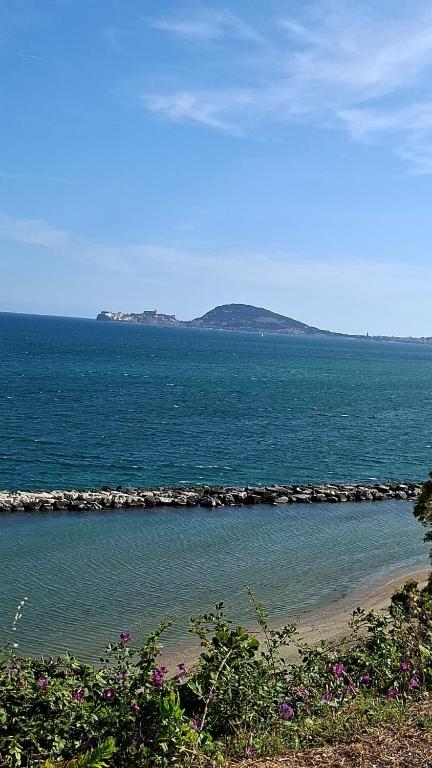 an island in the middle of a large body of water at Holiday House Ginevra in Formia