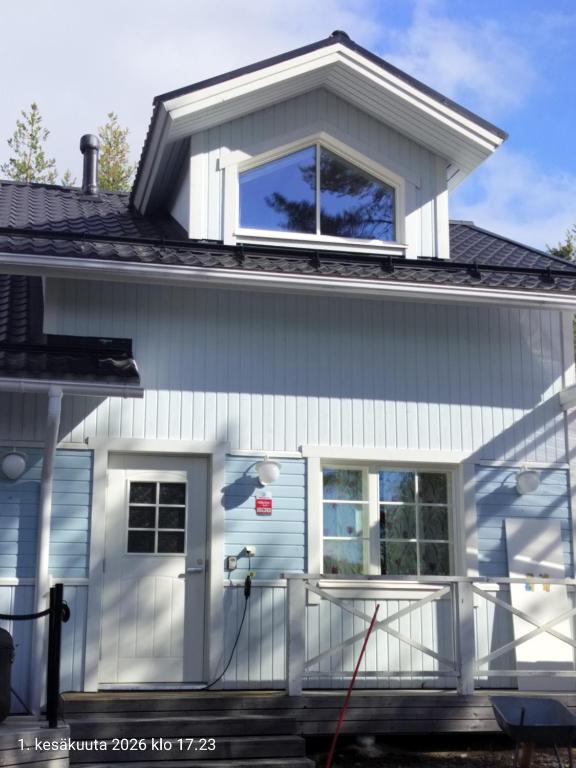 a house with a window on top of it at Holisko in Ylläsjärvi