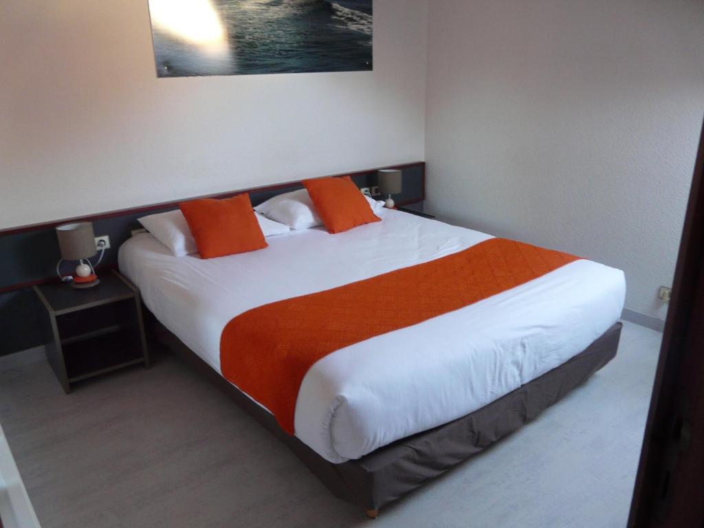 Säng eller sängar i ett rum på Hôtel de la baie de Paimpol