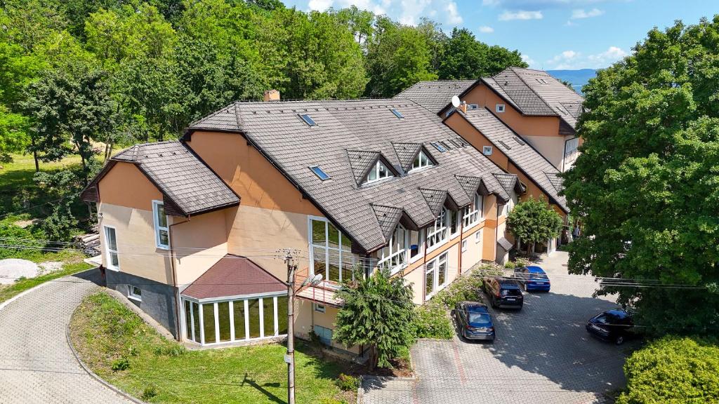 an aerial view of a large house at Hotel Empire Europe in Prievidza