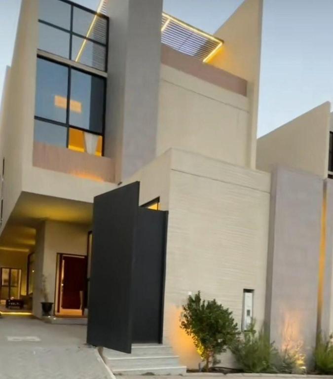 a large white building with a solarium on it at فيلا ابها 3 in Abha