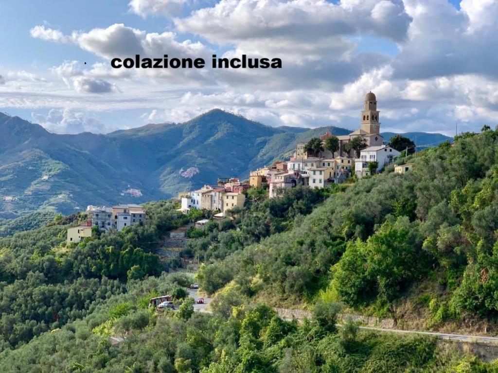 a town on a hill in the mountains at Agriturismo I Pipetta in Levanto
