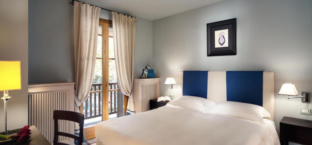 Posteľ alebo postele v izbe v ubytovaní Val di Luce SPA Resort