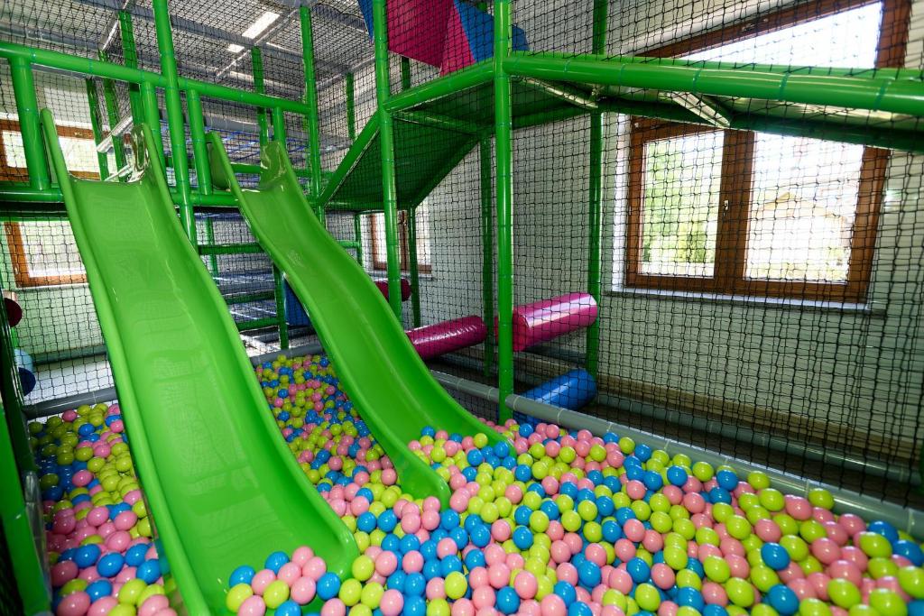 a play room filled with lots of balls at Apartamenty u Piekorza in Szaflary