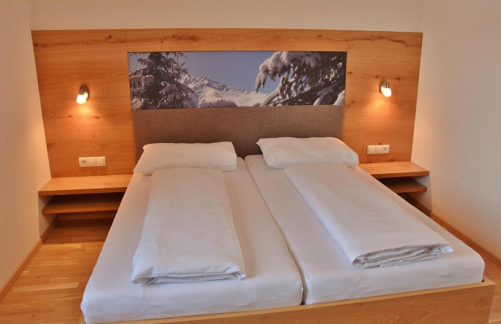 Postel nebo postele na pokoji v ubytování Appartement Schneekristall